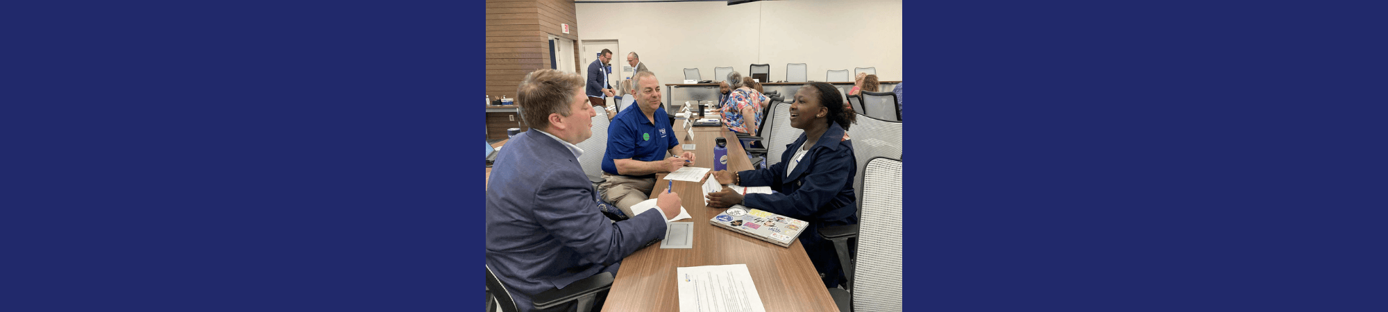United Way student board member at a meeting