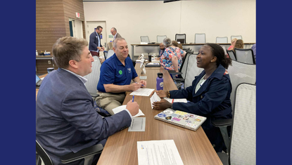 United Way student board member collaborates at a meeting